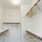 a closet with hangers