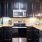 a kitchen with black appliances